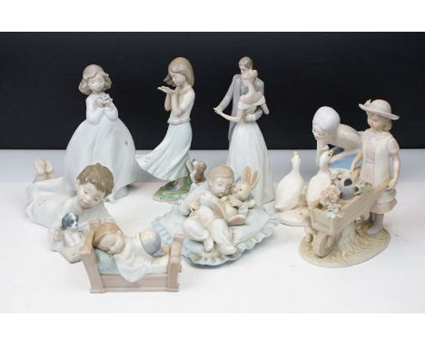 Collection of porcelain figures to include Lladro (6791 Taking a Snooze, 8121 Whispering Breeze, 8107 Together Forever), Nao 