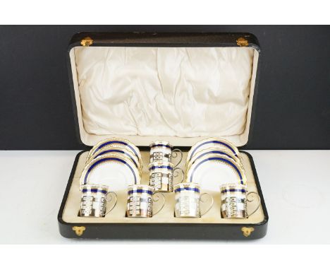 Early 20th century cased set of six Aynsley coffee cups &amp; saucers with cobalt blue &amp; gilt decoration, the cups with p