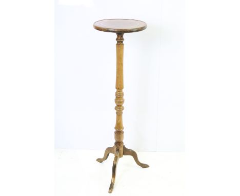 20th century hardwood torchere, the circular top inlaid with two concentric circles, above turned support and tripod base, 99