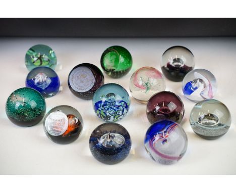 Collection of Caithness paperweights including limited edition examples. Lot to include Merry Go Round 285/750, Wind chimes M