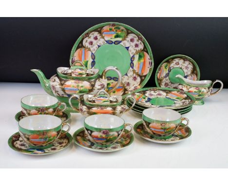 Vintage mid 20th Century Japanese Samurai tea service having a green ground with hand painted details. Printed makers marks t
