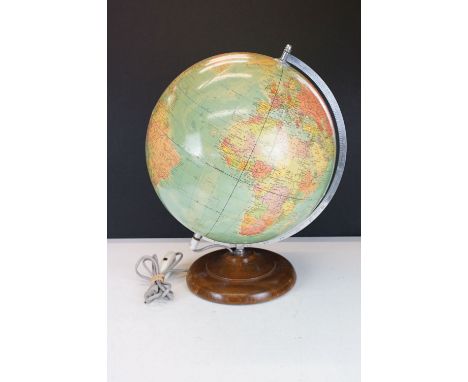 ' Rath Politiska Jordglob 'mid 20th C illuminating terrestrial globe, made in GDR, raised on a wooden base. Measures approx 4