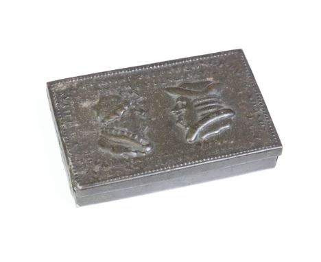 An antique Victorian tin snuff box with repousse lid titled 'The Wedding Day' 