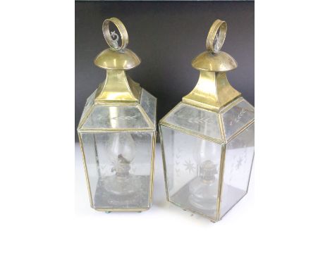Late 19th / early 20th century pair of brass framed glass oil lamp lanterns, the glass panels with engraved decoration, appro
