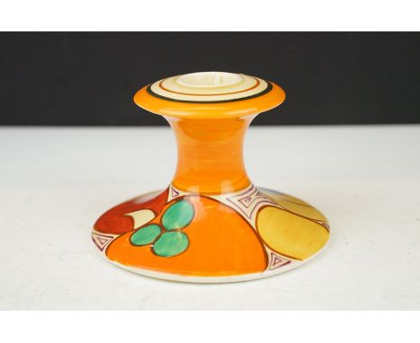 Clarice Cliff for Newport Pottery - A Fantasque Bizarre range candlestick raised on a circular foot, with typical hand painte