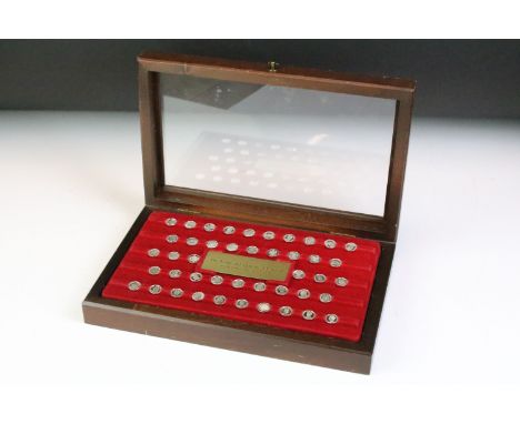 A cased silver miniature coin collection titled 'The Kings &amp; Queens of England' 