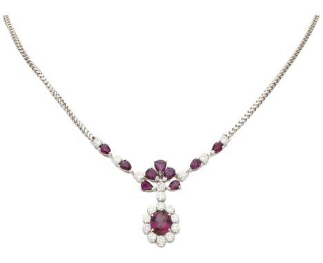 18K White gold pendant on necklace set with approx. 1.28 ct. diamond and natural ruby. Set with 18 brilliant cut diamonds of 