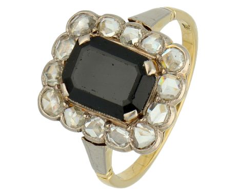 14K Yellow gold entourage ring set with simili and rose diamonds. Set with black rectangular simili stone (approx. 9.23 x 6.7
