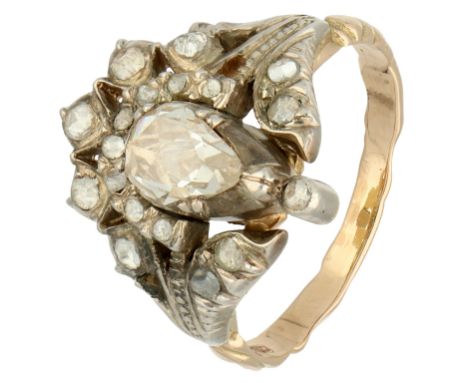 Gold/silver 'peacock' ring set with rose cut diamonds. Ring in the shape of a peacock with open tail set with 18 rose cut dia