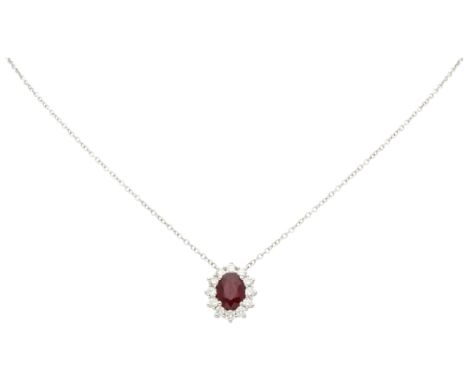 18K White gold entourage pendant on necklace set with ruby and diamonds. Set with oval faceted natural ruby of approx. 1.20 c