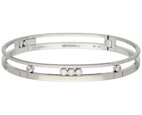 Messika 18K white gold 'Move Romane' bangle bracelet set with approx. 0.72 ct. diamond. Set with 100 brilliant cut diamonds o