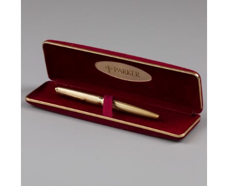 Parker fountain pen gold. Gold Parker fountain pen with arrow-shaped clip. Equipped with wave patterns and provided with a ca