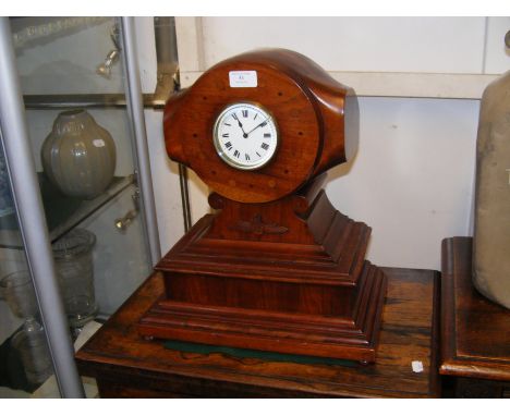 An unusual mantel clock fashioned from a wooden aircraft propeller - made by Walter John Nobbs, cabinet maker and aircraftman