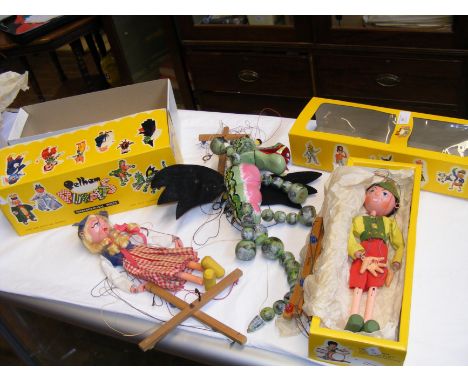 A boxed Pelham Puppet 'Tyrolean Boy', together with 'Mother Dragon' and an unboxed Pelham Puppet 