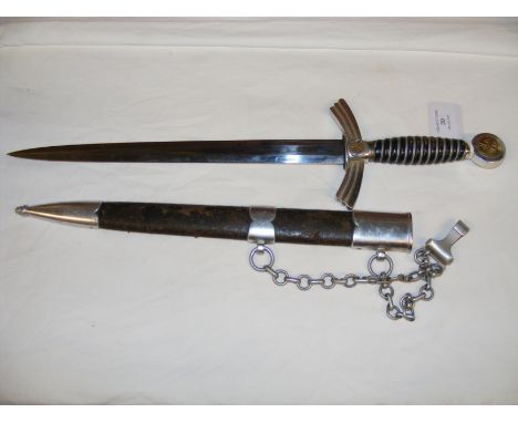 A WWII German Officer's dagger with leather wire grip and swastika pommel - 49cms long overall, with metal and leather scabba