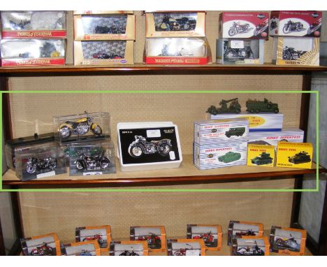 A collection of Maisto model motorbikes and Dinky Toys military vehicles 