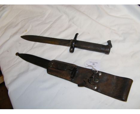 A WWII bayonet with metal scabbard - 35cm long overall