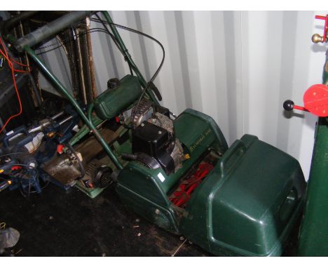 A Balmoral 14SE petrol driven mower with roller 