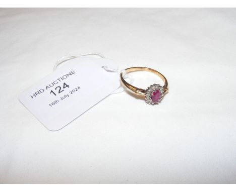 A red stone dress ring in 9ct gold mount 