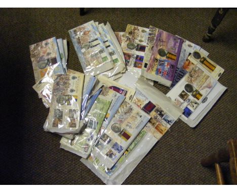 Two boxes of First Day Covers, together with replica medals 