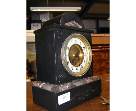 A Victorian slate and marble mantel clock