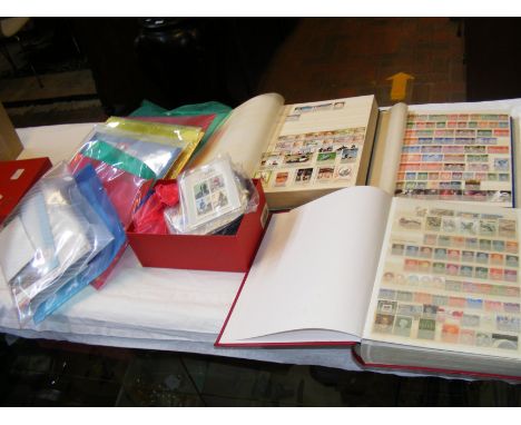 A box containing a large collection of collectable stamps and First Day Covers - GB and World