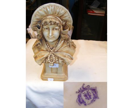An Austrian ceramic female bust by Stellmacher - 32cms high