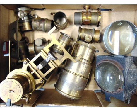 ASSORTED MAGIC LANTERN LENSES  most with lacquered brass barrels (largest two lacking glass lenses); together with two other 