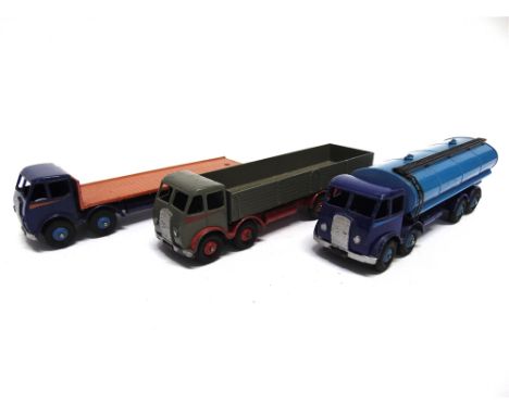 THREE DINKY DIECAST MODEL LORRIES  comprising a Dinky No.501, Foden Diesel 8-Wheel Wagon, first type cab, dark grey with red 