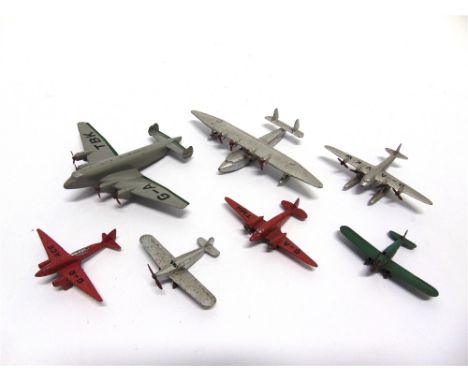 SEVEN ASSORTED DINKY DIECAST MODEL AIRCRAFT  comprising a Light Racer, red; Flying Boat, silver; Seaplane, silver; Light Tour