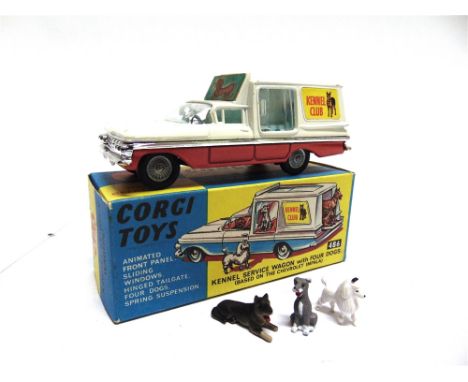 A CORGI NO.486, KENNEL SERVICE WAGON WITH DOGS  white over red, very near mint, complete with 'animated front panel' and thre