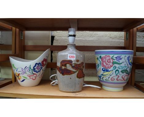 Two Poole pottery vases, (one cracked), largest 19.5cm high; together with three pottery hors d'oeuvres dishes. 