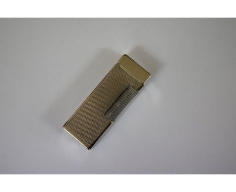 A Dunhill plated lighter.
