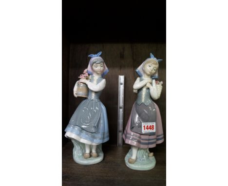 Two Lladro figures, comprising: 'Nature's Bounty', model 1417; and 'Budding Blossoms', model 1416, 27cm high. 