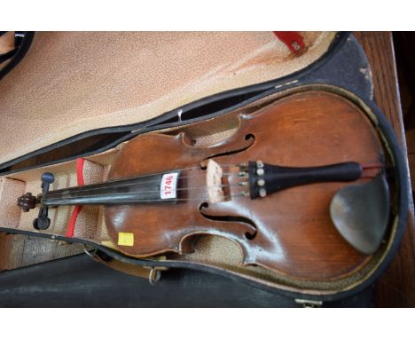 A circa 1920 violin, labelled 'Copy of Antonius Stradivarius...,made in Czecho-slovakia', with 14 inch back, in case.