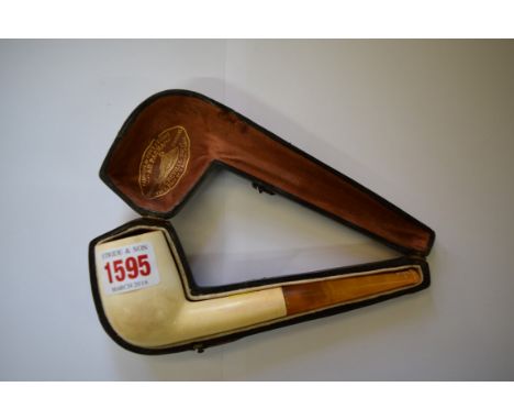 A cased meerschaum pipe, the case inscribed 'Au Pacha,...Paris'.