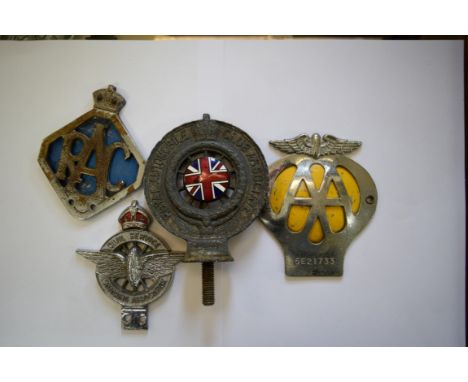 Four car radiator badges, comprising: an enamelled Royal Automobile Club Associate example; an AA example, no.5E21733; a Moto