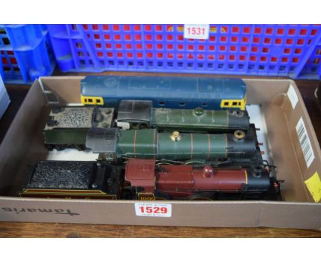 Two Hornby OO gauge locomotives and tenders; another Hornby O gauge locomotive; and a Lima O gauge diesel locomotive. 