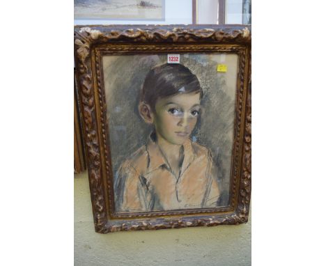 Follower of Eric Kennington, head and shoulders portrait of a young boy, indistinctly signed, pastel, 45 x 35cm. 