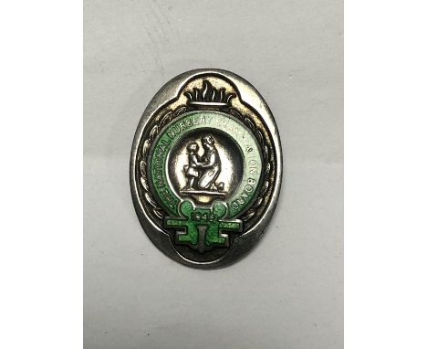 National Nursery Examination Board 1945 hallmaked silver badge