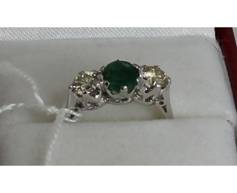 18ct white gold three stone emerald and diamond ring 