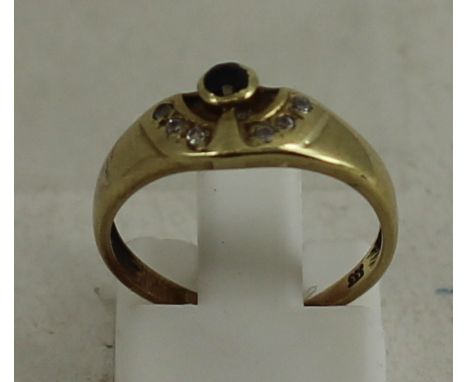 Yellow gold ring with blue stone and diamonds. Size L. Total weight: 1.6g