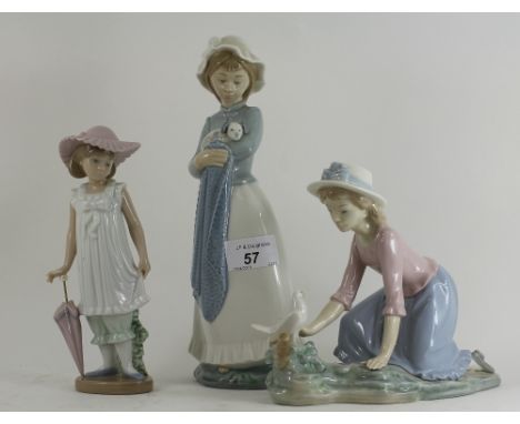 3 Nao Lladro girl figurines. Largest is 10" high. 1 AF. 