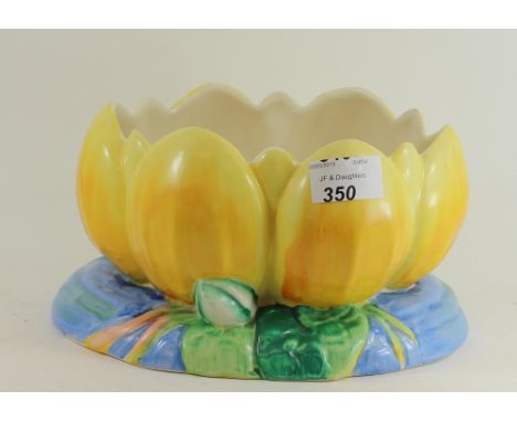 A Clarice Cliff lily shaped planter decorated in pastel shades 