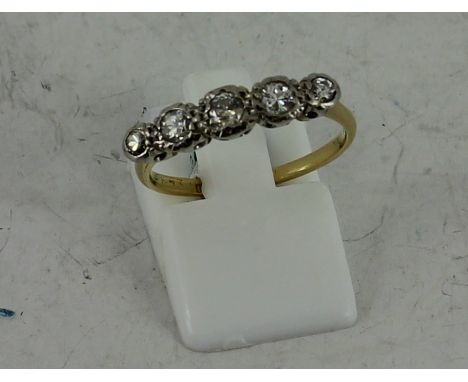 18ct yellow gold diamond ring 3g. Size: O. Apprx 0.60cy 5 stone old cut diamonds 