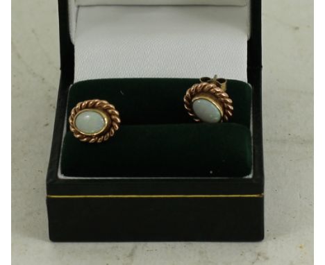 9ct gold and opal stud earrings. Total weight 3.6g 