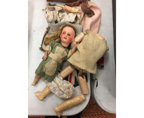 A COLLECTION OF VINTAGE DOLL PARTS AND CLOTHES 