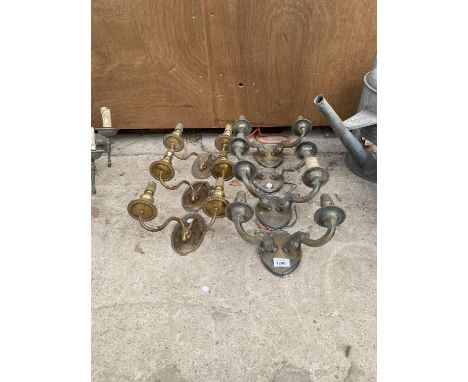 A COLLECTION OF SEVEN DECORATIVE BRASS LIGHT FITTINGS 