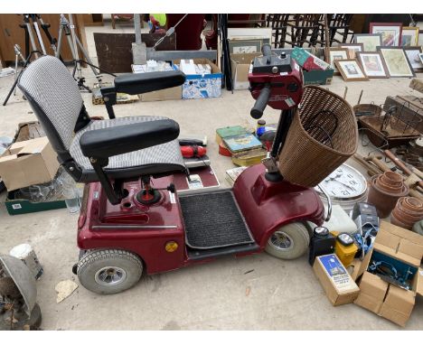 A SHOPRIDER MOBILITY SCOOTER WITH KEY AND CHARGER BELIEVED WORKING ORDER BUT NO WARRANTY 