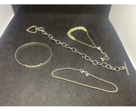 FOUR VARIOUS SILVER BRACELETS TO INCLUDE A BANGLE AND HEART CHARM ETC 